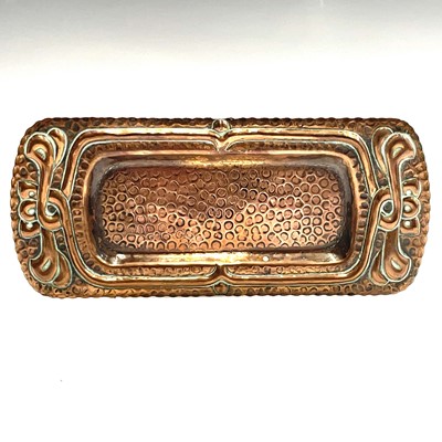 Lot 228 - A Newlyn copper circular tray, with planished...