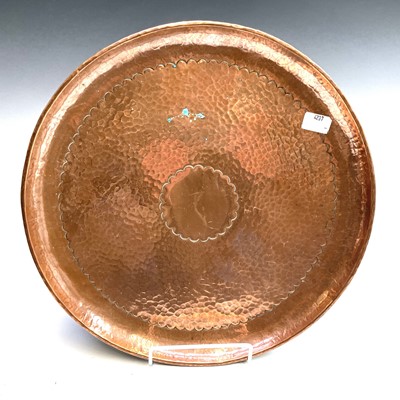 Lot 228 - A Newlyn copper circular tray, with planished...