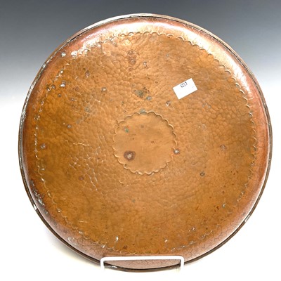 Lot 228 - A Newlyn copper circular tray, with planished...