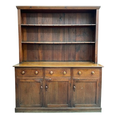 Lot 3191 - A late Victorian walnut dresser, the panelled...