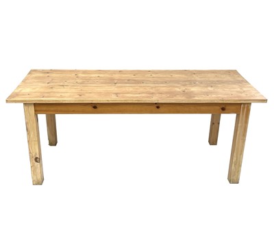 Lot 62 - A pine rectangular kitchen table, mid 20th century.
