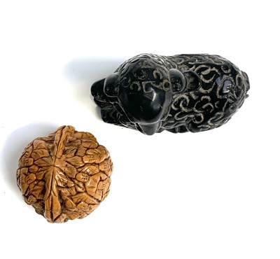 Lot 420 - A Chinese carved walnut shell, depicting...