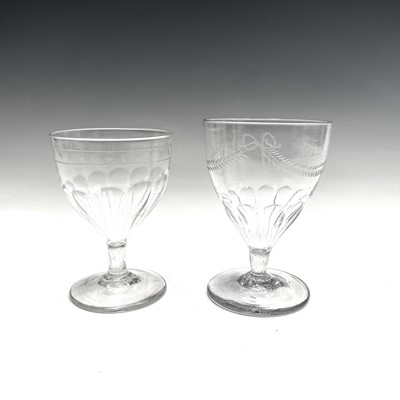 Lot 1056 - A Regency glass rummer, engraved with ribbon...