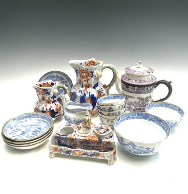 Lot 1058 - An English porcelain blue and white part tea...