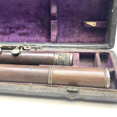 Lot 367 - Two sections of a 19th century flute by Rudall,...