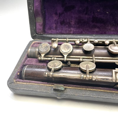 Lot 367 - Two sections of a 19th century flute by Rudall,...