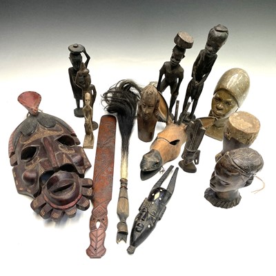 Lot 372 - An African wood carved figure together with...