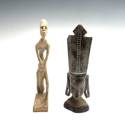 Lot 372 - An African wood carved figure together with...