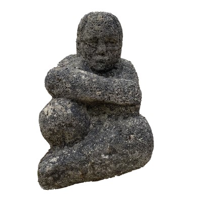 Lot 602 - A reconstituted stone seated female form....