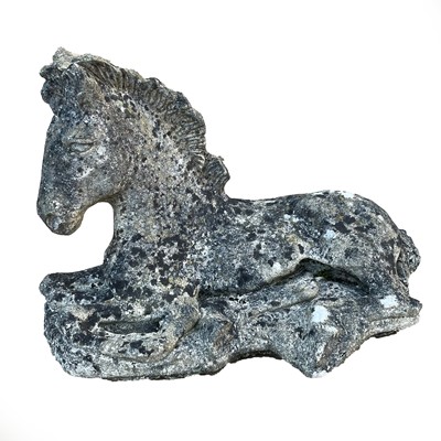 Lot 615 - A cast concrete figure of a recumbent foal,...