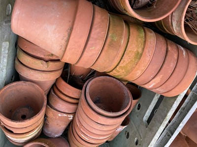 Lot 629 - Three crates of terracotta plant pots of...