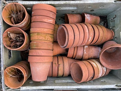 Lot 629 - Three crates of terracotta plant pots of...