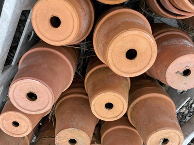 Lot 629 - Three crates of terracotta plant pots of...