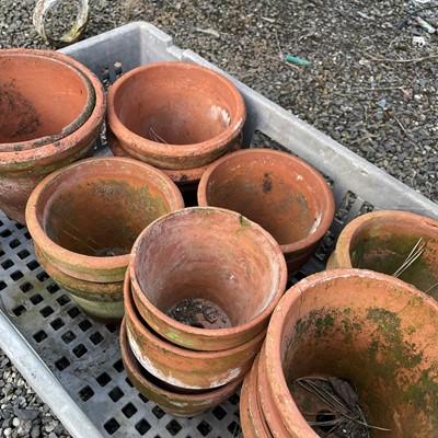 Lot 630 - Three crates of terracotta plant pots of...