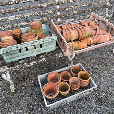 Lot 630 - Three crates of terracotta plant pots of...