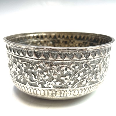 Lot 1052 - A set of four Indian white metal bowls, each...