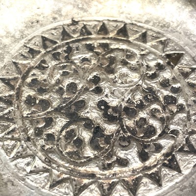 Lot 1052 - A set of four Indian white metal bowls, each...