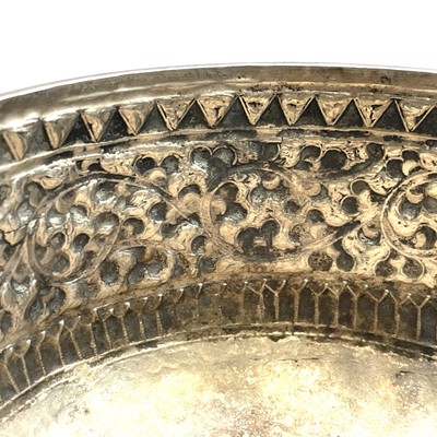 Lot 1052 - A set of four Indian white metal bowls, each...