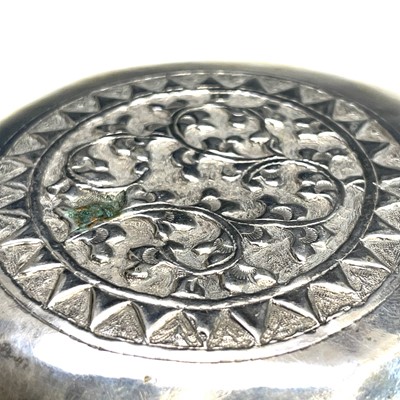 Lot 1052 - A set of four Indian white metal bowls, each...