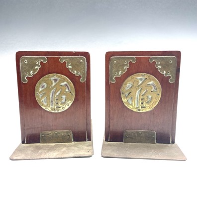 Lot 438 - A pair of Chinese hardwood and brass mounted...