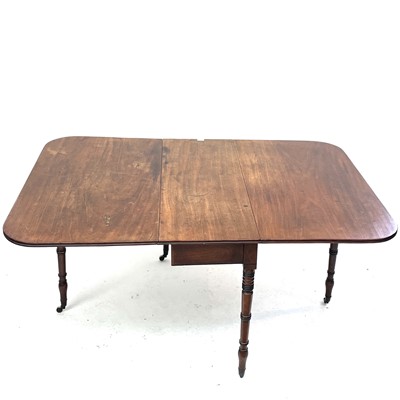 Lot 3003 - A 19th century mahogany drop leaf table with...