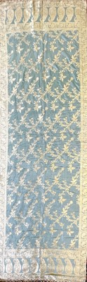 Lot 1055 - An Indian silk and gold embroidered shawl, the...