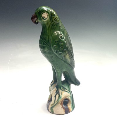 Lot 533 - A Chinese green glazed model of a parrot,...