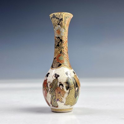 Lot 487 - A Japanese Satsuma miniature porcelain vase,...