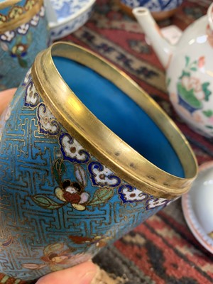 Lot 494 - A pair of Chinese cloisonne cylindrical jars...