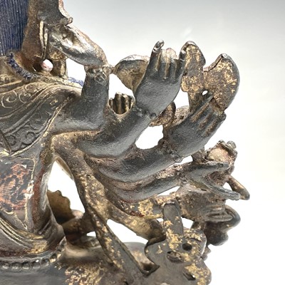 Lot 491 - A Sino-Tibetan gilt bronze figure of a...