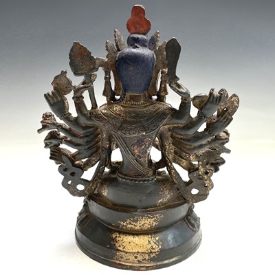 Lot 491 - A Sino-Tibetan gilt bronze figure of a...