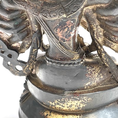 Lot 491 - A Sino-Tibetan gilt bronze figure of a...