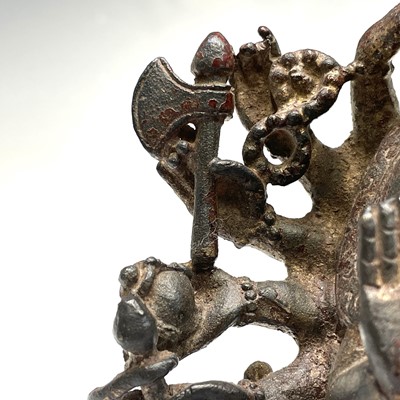 Lot 491 - A Sino-Tibetan gilt bronze figure of a...