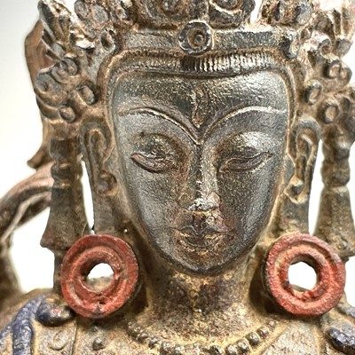 Lot 491 - A Sino-Tibetan gilt bronze figure of a...