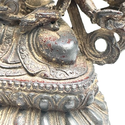 Lot 491 - A Sino-Tibetan gilt bronze figure of a...
