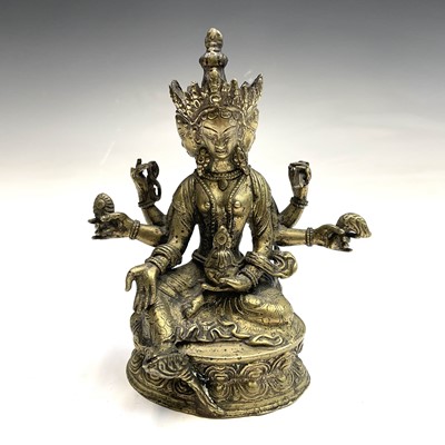 Lot 492 - A Sino-Tibetan gilt bronze figure of a...