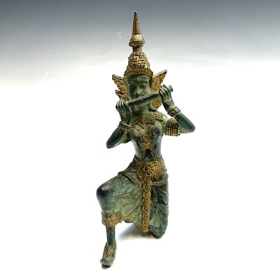 Lot 496 - A Thai gilt and painted bronze figure of a...