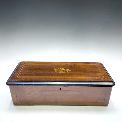 Lot 9 - A Swiss rosewood and inlaid cylinder music box,...