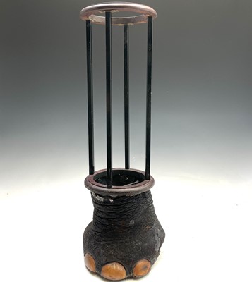 Lot 1058 - A taxidermy elephants foot mahogany stick...