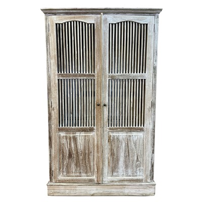 Lot 498 - A Balinese limed hardwood wardrobe, 20th...