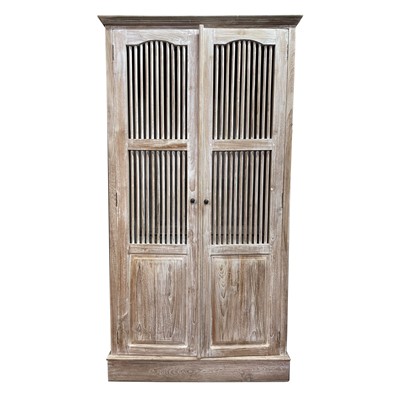 Lot 499 - A Balinese limed hardwood wardrobe, 20th...