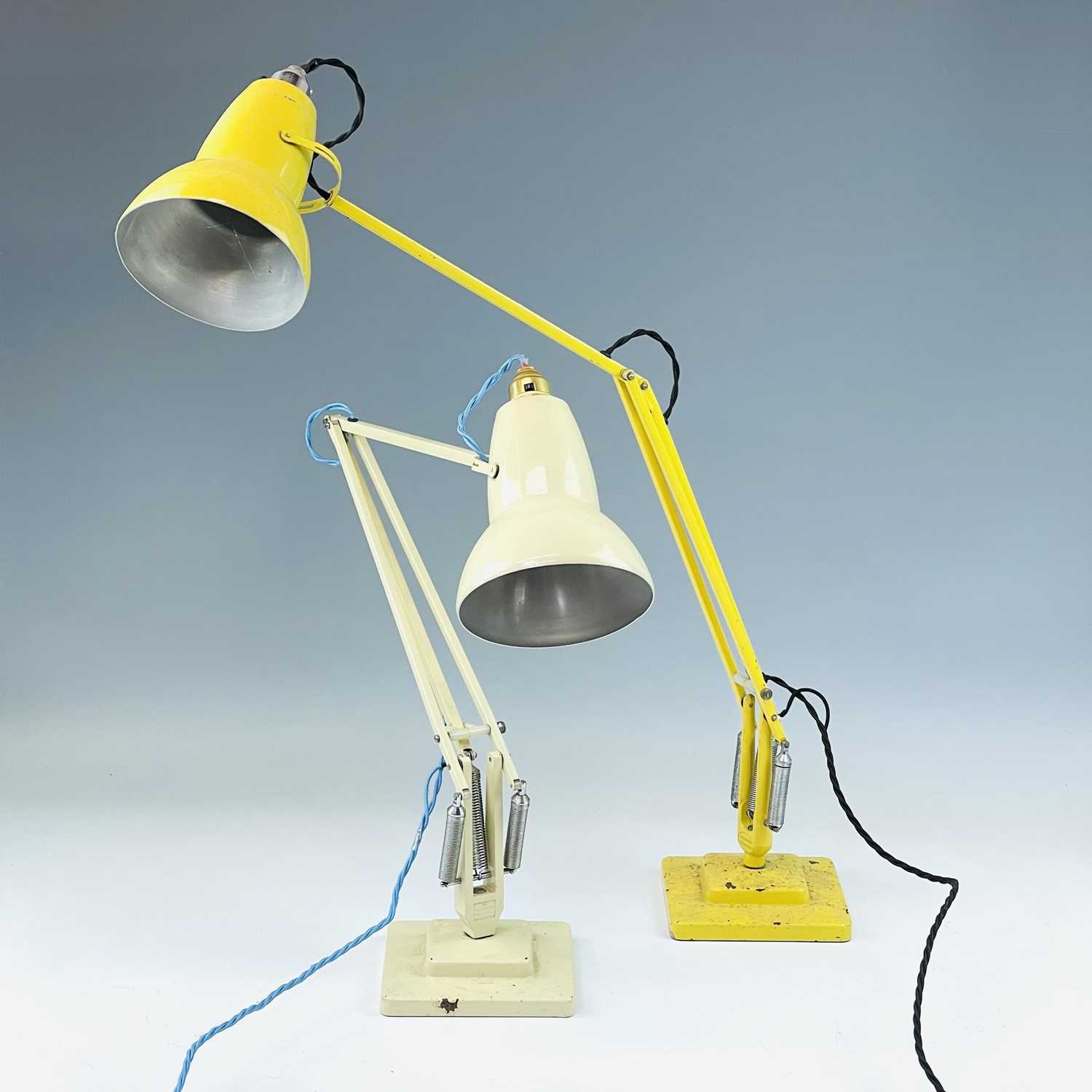 Lot 91 - Two Herbert Terry anglepoise lamps, one in a...