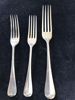 Lot 210 - A 1930's part canteen of silver plated cutlery...