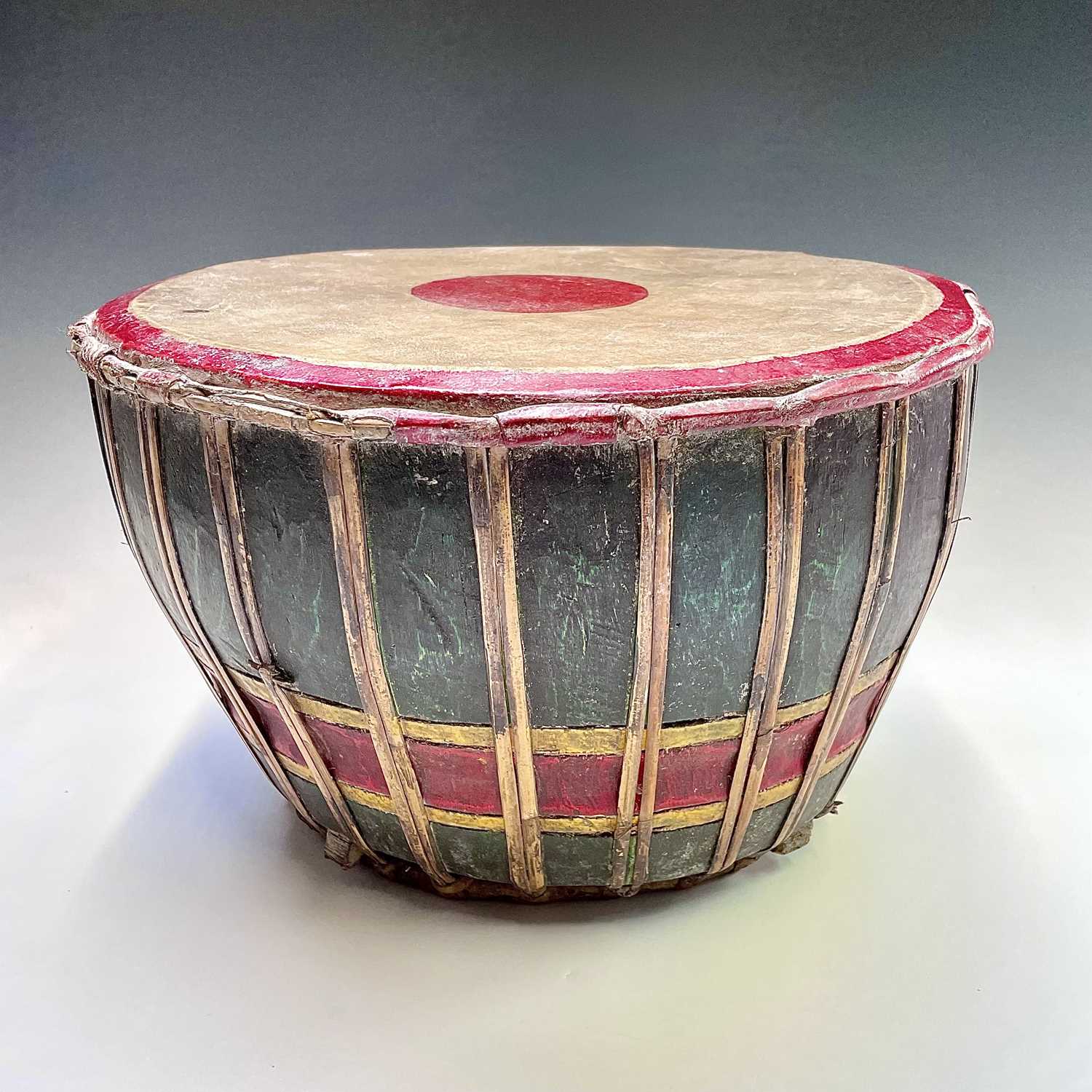 Lot 518 - A Balinese painted wood drum, mid 20th