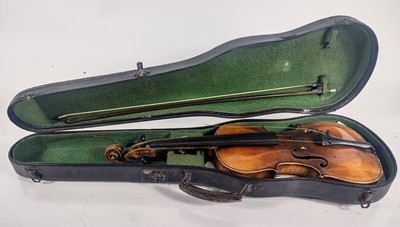 Lot 137 - A late 19th century cased violin and bow.