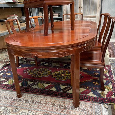 Lot 589 - A Chinese reproduction hardwood extending...