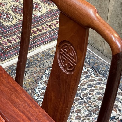 Lot 589 - A Chinese reproduction hardwood extending...