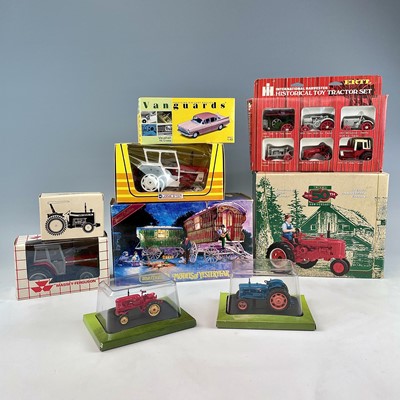 Lot 760 - Boxed Tractors, etc. A box containing 7 boxed...