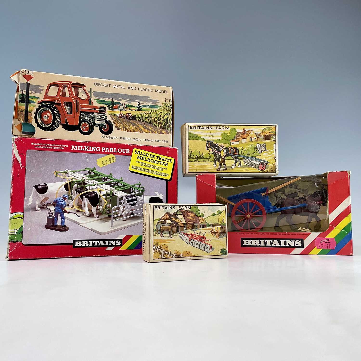 Lot 761 - Britains Boxed Farm Equipment (x5). Includes a...