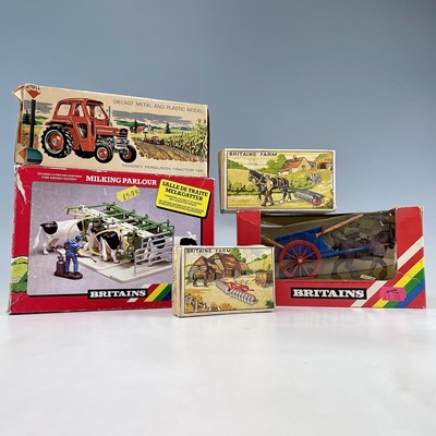 Lot 761 - Britains Boxed Farm Equipment (x5). Includes a...